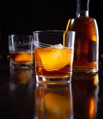 glasses of bourbon with big ice cube-7541 copy